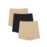 Conjunto de Shorts Segunda Pele disponível em três cores: bege, preto e branco. Design sem costura que garante conforto e suavidade, ideal para um ajuste perfeito sob qualquer roupa.