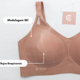 Sutiã Cygnuss com modelagem 3D, destacando bojos respiráveis e estrutura anatômica para sustentação confortável. A imagem inclui marcações que evidenciam o design ergonômico do produto