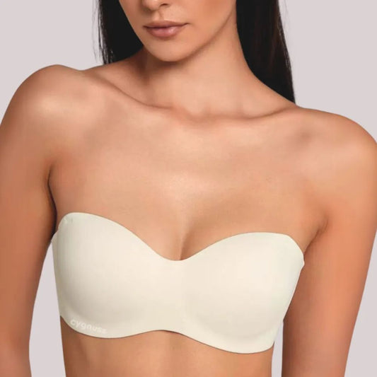 Modelo vestindo o sutiã tomara que caia LOOK da Cygnuss, com design minimalista, sem alças e acabamento seamless para conforto e sustentação.